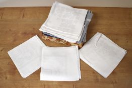 Assorted place setting to include white damask, cotton linen in cobalt, grey, yellow and indigo.
