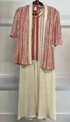 A circa 1970s vintage Mary Farrin knitted two piece outfit in beige and coral open knit comprising a
