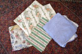 A quantity of 20th century vintage curtains and bedding, to include sink skirts or kitchen