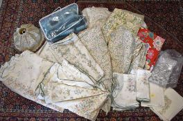 A quantity of home English Chintz themed homeware, linens and fabrics to include a tasselled