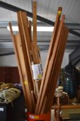 Assorted weavers sticks and woodwork used to cerate open weave knit work, along with a wooden