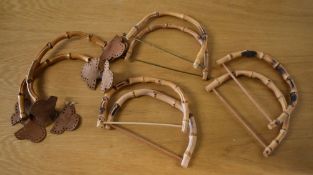 Four pairs of circa 1940-50s vintage bamboo bag handles measuring 8.5. X 5 inches approximately.