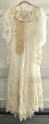 A 20th century vintage maxi dress in cream white cotton muslin, has mutton sleeves with layered