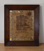 A framed and glazed Victorian needlework sampler performed by 'E.L' and depicting a Hymn with