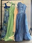 Five cool toned evening dresses to include a powder blue boat neck cocktail dress, a pastel green