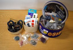 A quantity of assorted vintage statement buttons and buckles to include a range of colours and