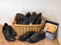 A quantity of antique clogs and morris dance shoes with tooled leather, many eyelets, studs and bell