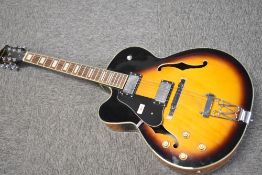 An Aria FA70 electric jazz guitar, left handed, serial number 106050407