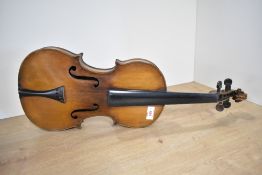 A traditional violin probably early 20th century having two piece back approx. 14' interior label