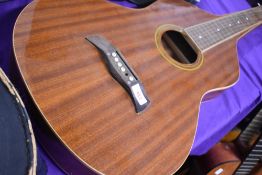 A Vando Weissenborn Hawaiian style electro acoustic guitar of teardrop form and fitted with a