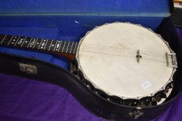 A vintage Barnes & Mullins five string banjo, having pearlescent resonator body , with card case