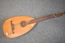 A traditional guitar style 6 string lute, having bowl back, overall length approx. 97cm