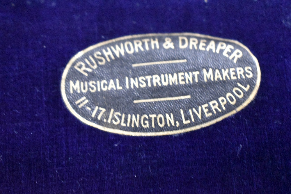An antique woodwind eight button flute, believed to be Rushworth and Dreaper, in fitted case - Image 2 of 3