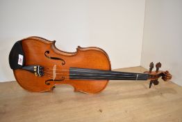 A modern violin, having two piece back, approx 14inch , labelled internally for Gliga Vasile, serial