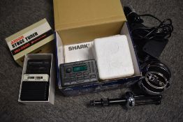 A really useful plastic box of accessories comprising Shark feedback eliminator, Arion stage tuner