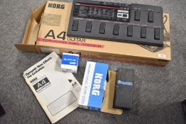 A Korg A4 guitar pedal , boxed, with additional volume pedal