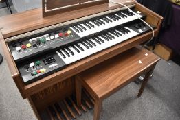 A vintage Yamaha Electone , model BK-5C serial number 2555 , sold with complimentary stool