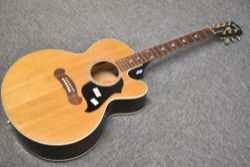A Gibson electro acoustic guitar, model J-180 EC, with impressed serial numbers to headstock and