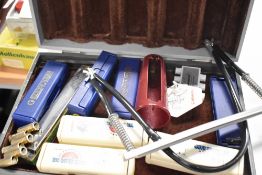 A selection of harmonicas etc including Hohner, with carry case and brace