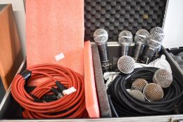 Six Shure SM58 Microphones, leads and four spare gauze shields, in cobra carry case