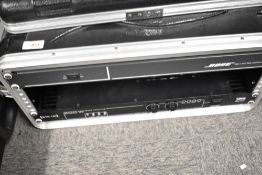 A Gator flight rack mount case, containing Bose 402C II systems controller and an IMG stageline 300W