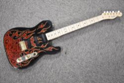 A USA made Fender Telecaster electric guitar, being James Burton signature paisley , imported in