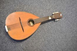 A traditional Spanish flat back pear shaped mandolin (8 string) , labelled internally Vicente
