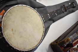 A vintage Windsor Popular banjo, in need of restoration