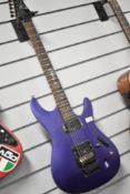 An Ibanez electric guitar , S Series, in purple