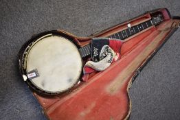 An early 20th Century John Grey & Sons, London Five String banjo having unusual Indian brass style