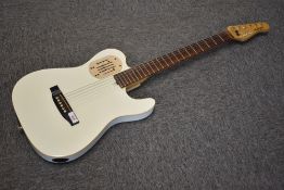 A Godin acousticaster electric guitar (LR Baggs model) in cream, in fitted hard case