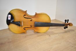 A traditional violin, having one piece back, approx. 14', paper label internally printed No10,