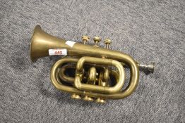 A vintage brassocket cornet, stamped Boosey & Co, Class A , serial number worn, probably H75883