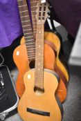 Three classical guitar bodies, including children's size