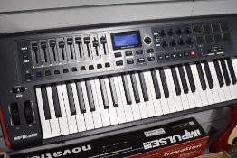 A Novation Impulse 49 USB midi keyboard, boxed and like new, no software