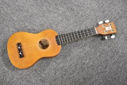 A modern ukulele, model Herald HUK15N, by John Hornby Skewes