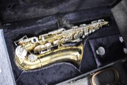 A King Saxophone, model 613, purchased from Boosey & Hawkes circa 1987, in fitted case with Rico