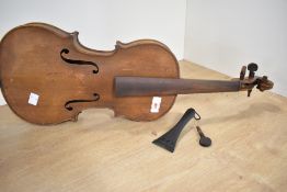 A traditional violin, having two piece back, approx. 14', sold with distressed bow and case