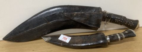 Indian made Nepalese Gurkha-style Kukri knife/daggers, two vintage ornamental pieces each having