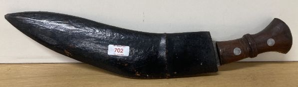 Indian Gurkha Kukri knife, having 35cm curved steel blade stamped with arrow between Co and I.G.