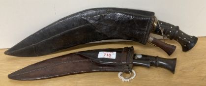 Indian made Nepalese Gurkha-style Kukri knife/daggers, two vintage ornamental pieces each having