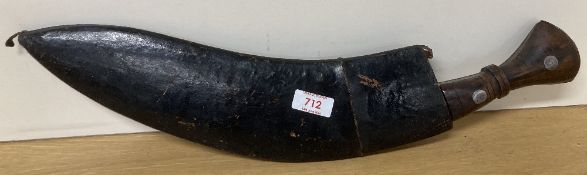 Indian Gurkha Kukri knife, having 35cm curved steel blade stamped with arrow between Co and I.G.