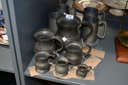 A selection of ten late 18th/19th and 20th-century pewter tankards, of varying sizes, some marked to