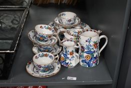 An early 20th-century Booths Silicon china 'Pompadour' tea set, to feature hand painted floral and