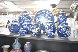 A large quantity of late 19th to early 20th-century Chinese blue and white porcelain prunus wares,