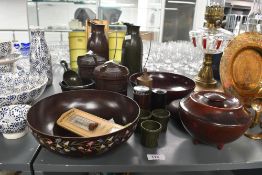 A selection of early to mid 20th-century bakelite wares, to feature an ELO ware lidded vessel upon