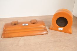An early 20th-century Art Deco John Dickinson and Company Limited 'Carvacraft' butterscotch amber