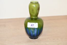 A late 19th-century Burmantofts Faience art pottery vase, featuring a green and blue drip crackled