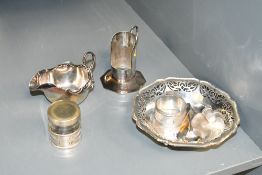 A small selection of late 19th to early 20th-century white metal and silver-plate ware, to feature