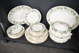 A quantity of 20th-century Wedgwood 'Santa Clara' pattern W4114 tableware, to feature green vine